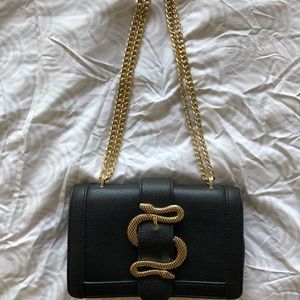 Black and Gold Express Interlocking Snake Shoulder Bag